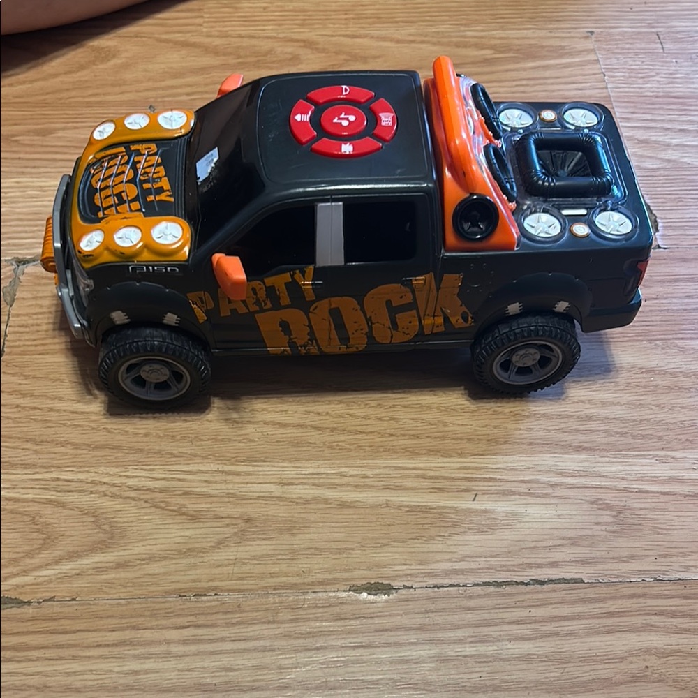 Party Rock Black and Orange Toy Truck